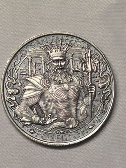 1 oz .999 Fine Silver Round produced by the Mason Mint, featuring Poseidon, the Ocean Emperor