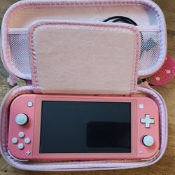 Coral Nintendo Switch Lite With Sakura Case 
