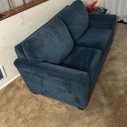 Couch,blue Length:77” Width:38” Height:31”