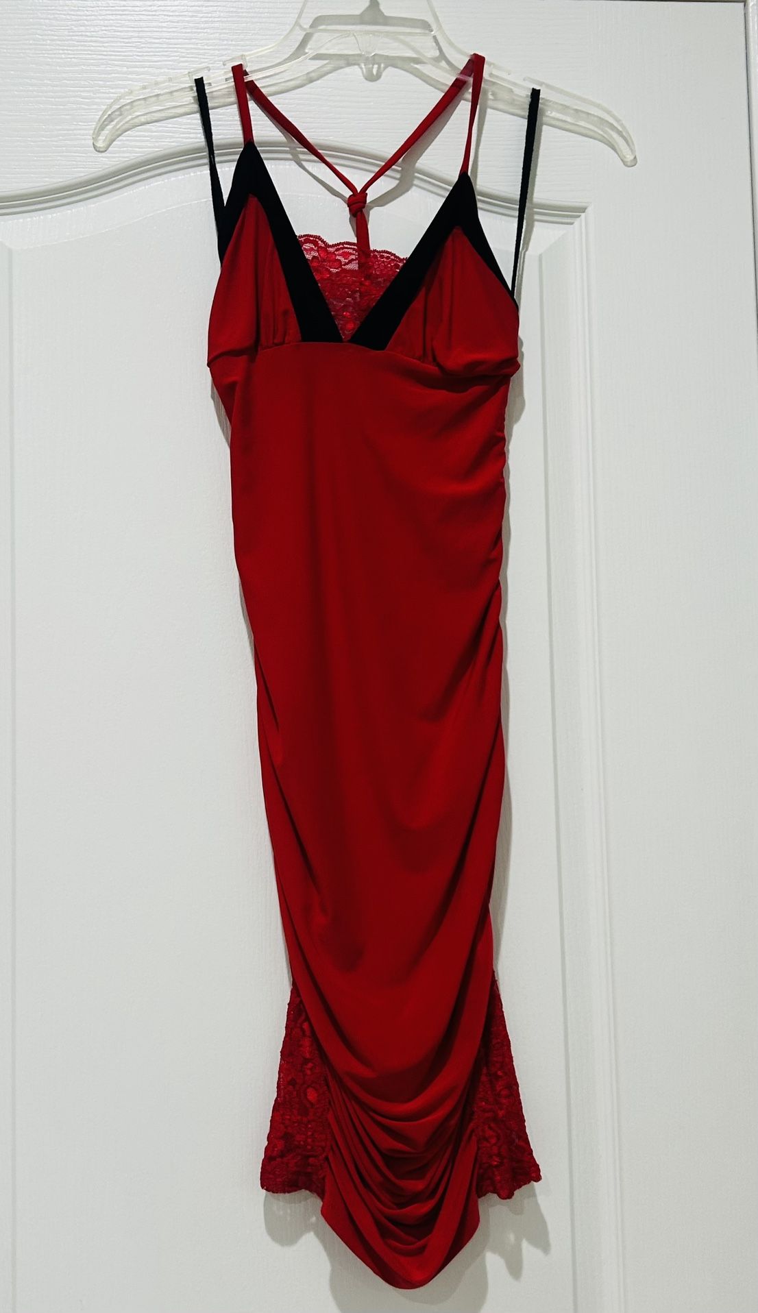 Red and black fitted dress with lace details