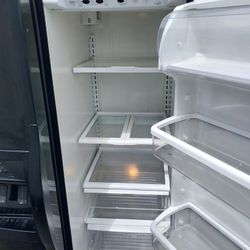 Kenmore ELITE  FRIDGE. WATER IN DOOR