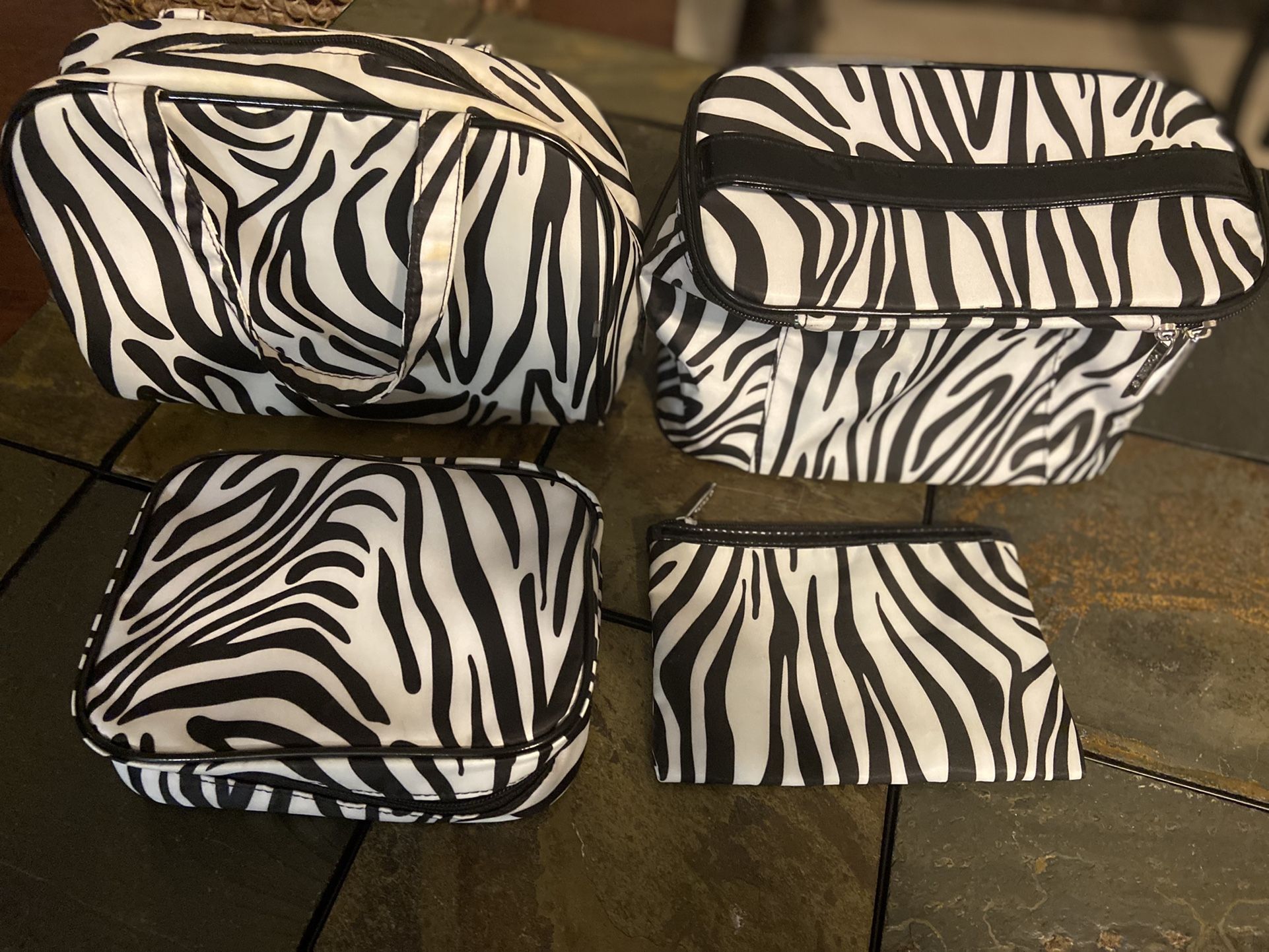 MODELLA 4-PC ZEBRA PRINT MAKE-UP BAG SET IN TURQUOISE LINING