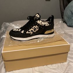 Brand Size 5 New Michael Kors sneakers. Speckled Haircalf