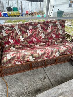 Rattan Futon With Tropical Floral Pattern Expands into Full Size Bed