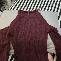 New. Shelly. Size Small. Color Purple/ Red. Long-sleeved, Cold-shoulder Top.