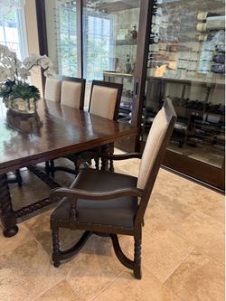 8 custom dining room chairs with real leather for sale!