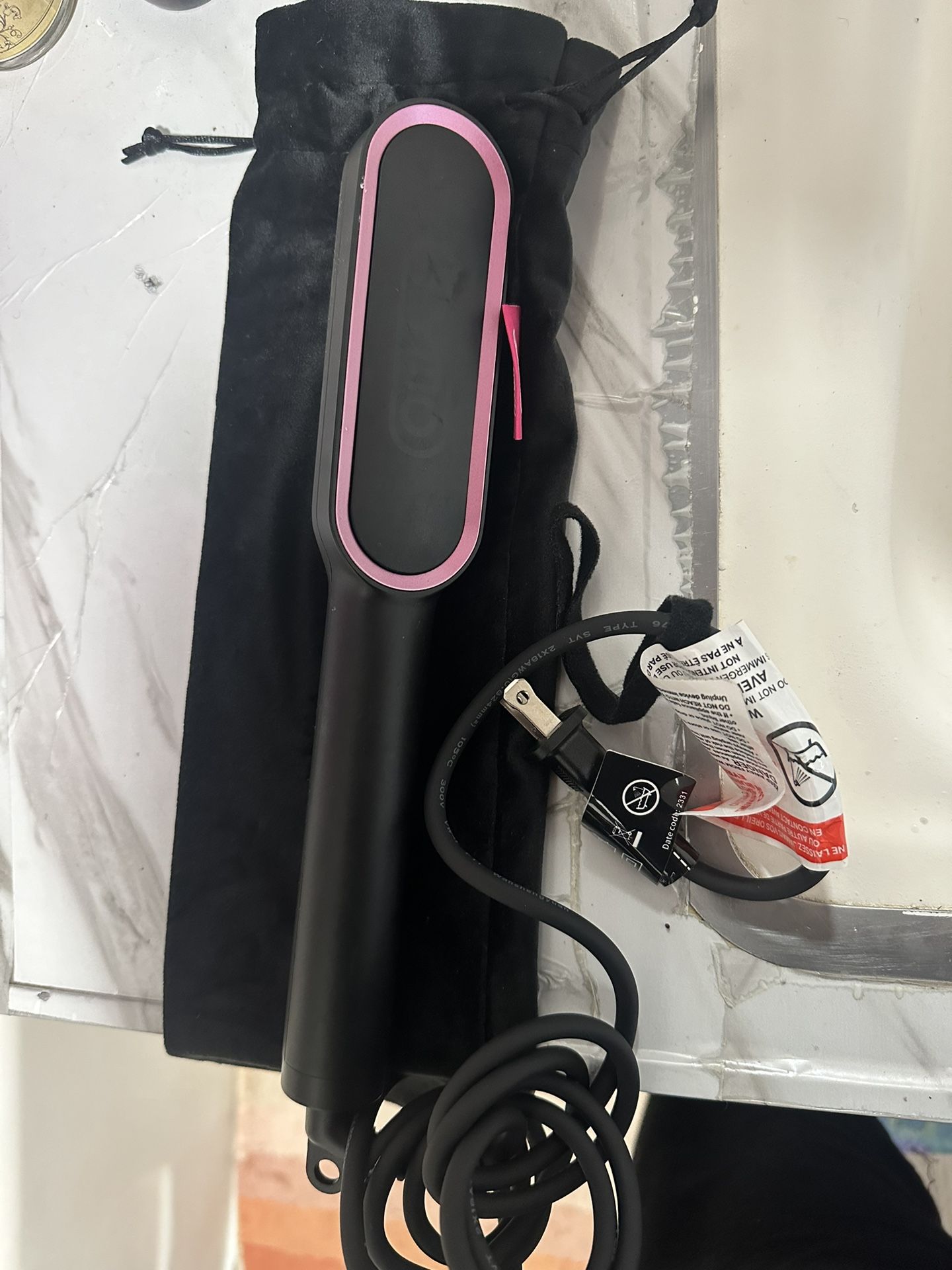 TYMO Ring Hair Straightener Brush ($35)