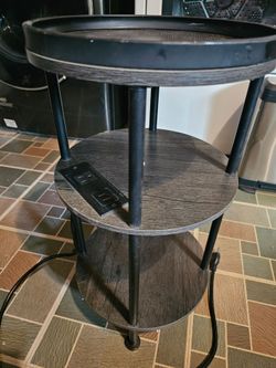 Round side table with charging station