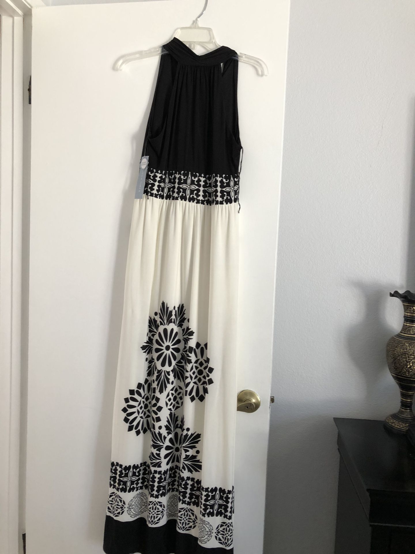 Beautiful black and white dress .