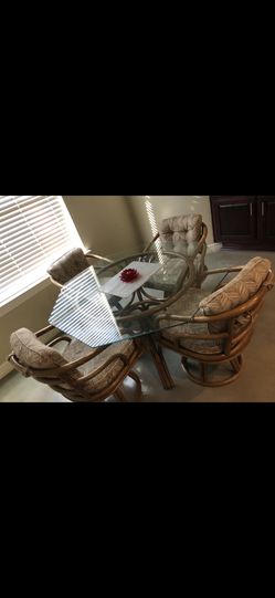 Glass Table + 4 Swivel Chairs