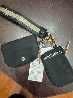 Lululemon dual pouch wristlet, black and gold,key coin pocket, brand new.