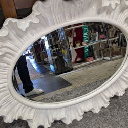 Large, Classy white ruffled mirror, Can be hung horizontally or vertically details in pictures. 
Measures 35 in wide 47 in tall