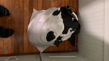 Big trash bag of scrap leather