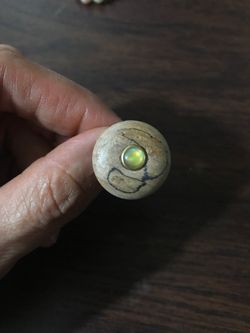 Wooden ring size 7 but it’s adjustable