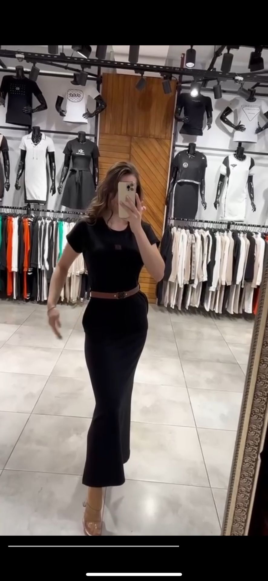Elegant black midi dress with short sleeves and waist-accenting belt. ✅ Versatile design — perfect for daily wear or evening outings ✅ Belt defines th