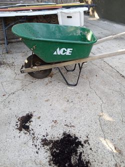 Ladders And Wheel Barrel