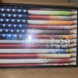 American flag with colored pencil puzzle piece 