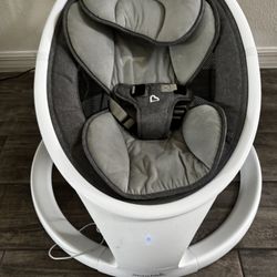 Munchkin Baby swing with music and motion