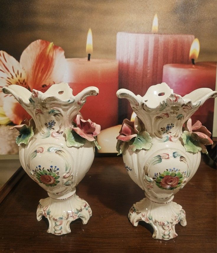 Vintage hand-painted Capodimonte-style vases.