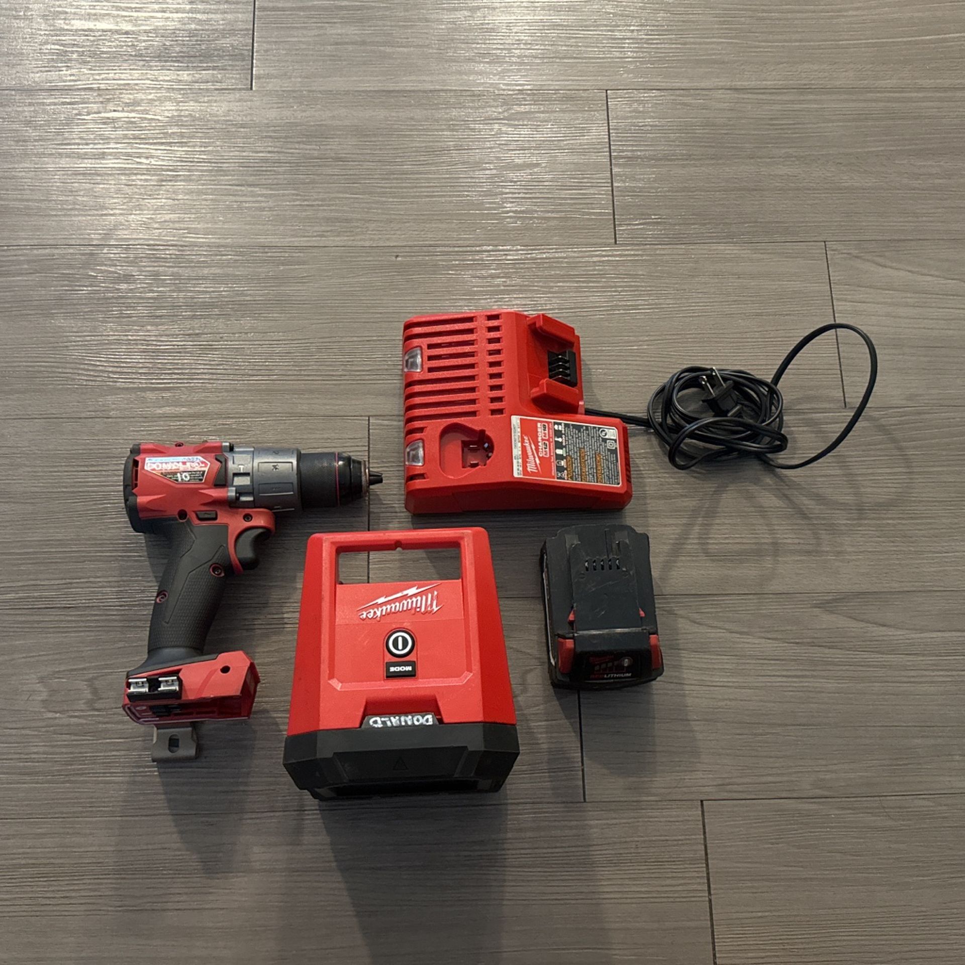 Milwaukee Drill & Light (one Battery, Charger)