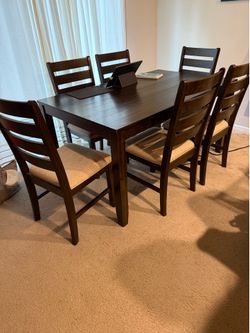 Dining table and 6 chairs. Complete set