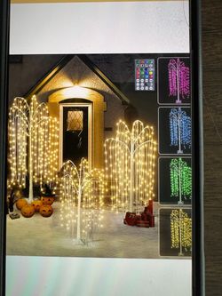 Three pieces of illuminated tree decoration