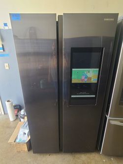 SAMSUNG BLACK STAINLESS SIDE BY SIDE REFRIGERATOR
