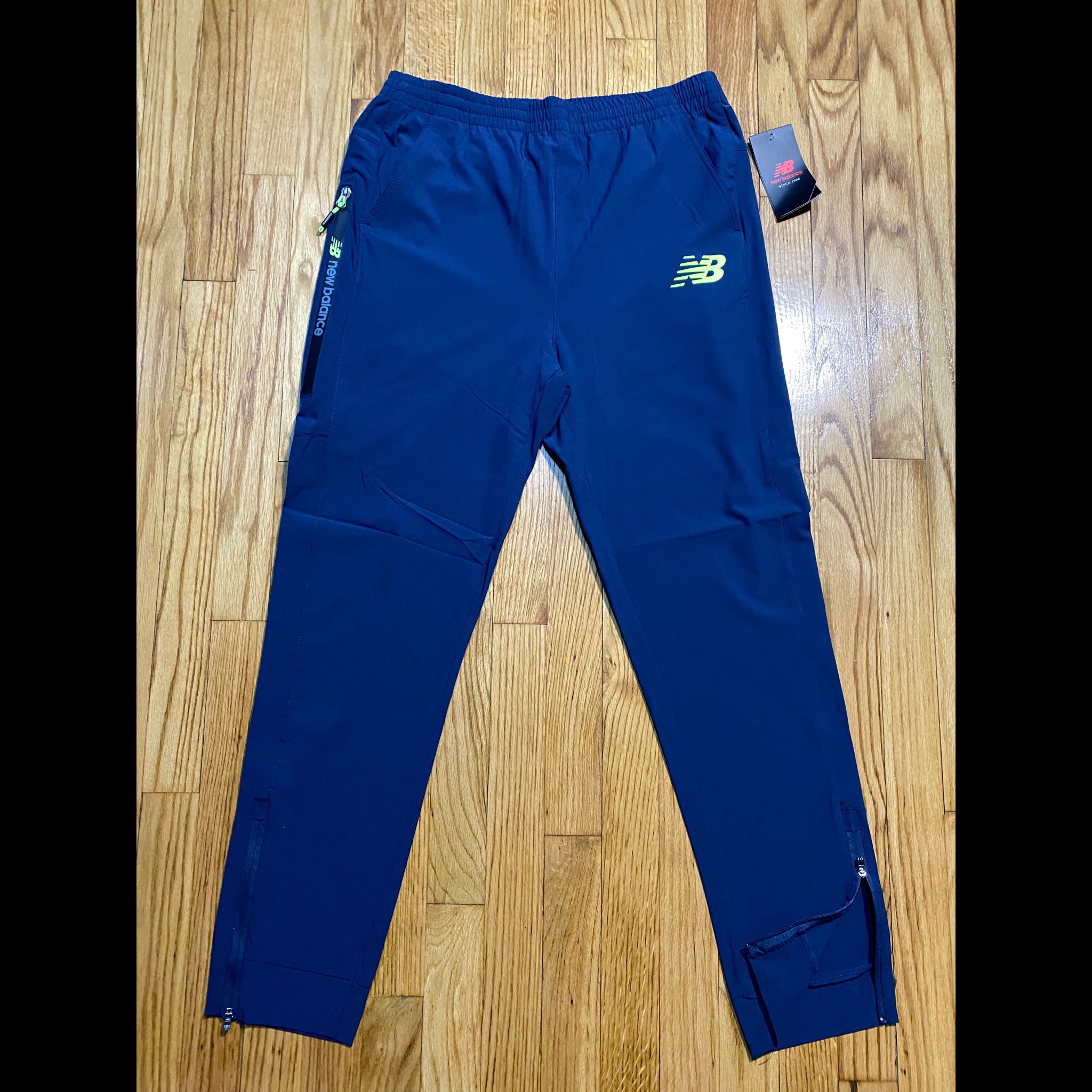 NEW BALANCE All Motion 4-Way Stretch Running Wind PANTS Zip pocket sz Large  for Sale in Bridgeport, CT - OfferUp