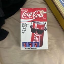 vintage coca cola dancing cola can with headphones and glasses still intact.