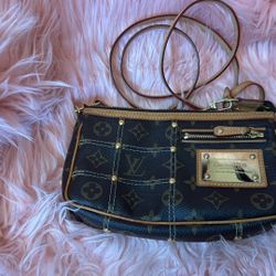 Louis Vuitton Monogram Rivet Pochette 