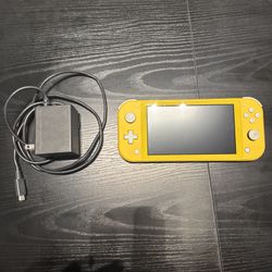 Nintendo Switch Lite – Yellow – Great Condition – Handheld Gaming On the Go!