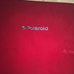 red/silver portable dvd player