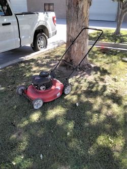 Red Gas-Powered Push Lawn Mower troy bilt