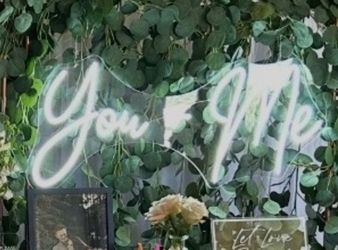 You + Me light-up sign