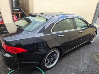 05 acura tsx  2.4 black door  run  good  power  windows  power  lock ac is cold sun roof relatable  car