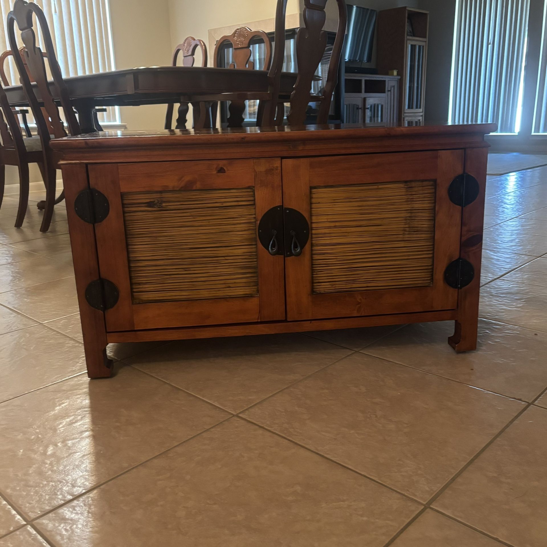 Oriental TV console, or could be used as a chest. Solid wood with bamboo striping. Beautiful. NEED T