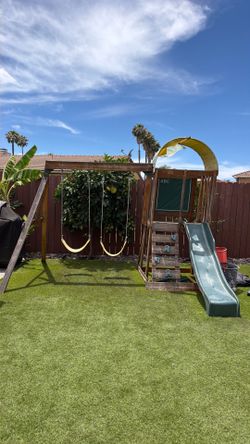 Swing set with slide