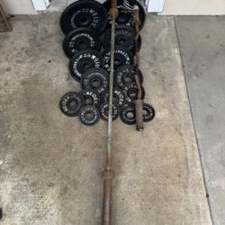 Olympic weights 253lbs total with 7ft 45lbs bar plus curl bar and weights tree