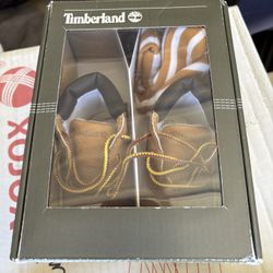 Baby Tims w a beanie 