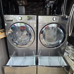 LG SMART BLACK STAINLESS STEEL WASHER AND DRYER SET WE STEAM ELECTRIC AND PEDESTAL 