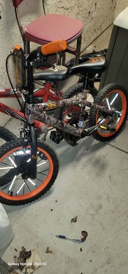 Two boys 16" bikes one new and one used firm price