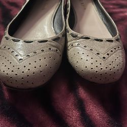Prada’s Perforated Patent Leather Flats