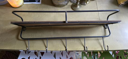 wall shelf with hanging hooks
