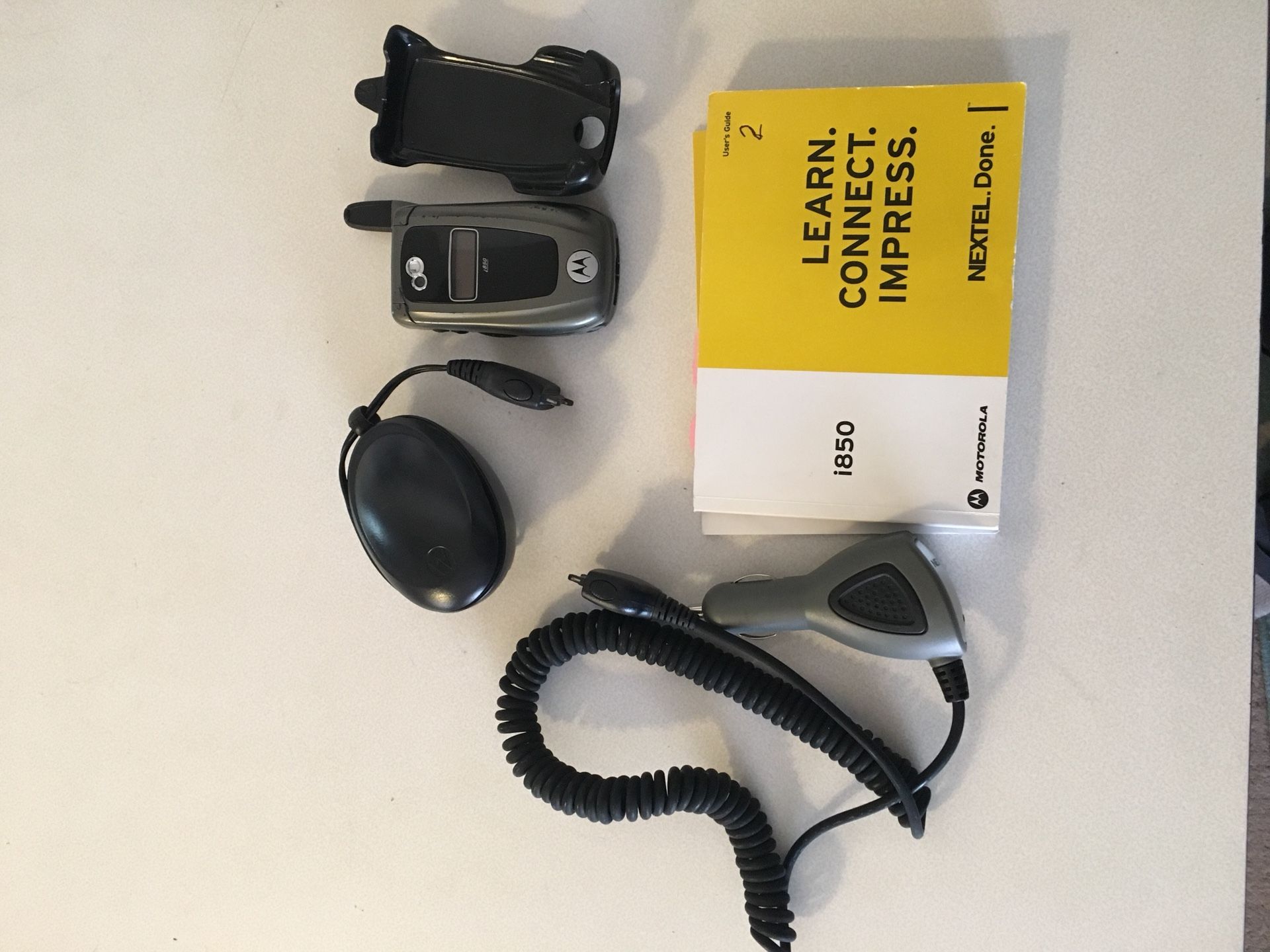 Nextel/Motorola i850 flip phone. AC/DC chargers and belt clip. OBO.