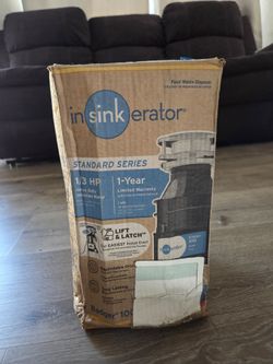 InSinkErator Badger 100 food waste disposer, featuring a 1/3 horsepower induction motor.