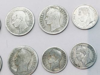 Venezuelan 5 Bolivares coin made of .900 fine silver.each $80 The obverse features the Venezuelan coat of arms, bearing the text "ESTADOS UNIDOS DE VE