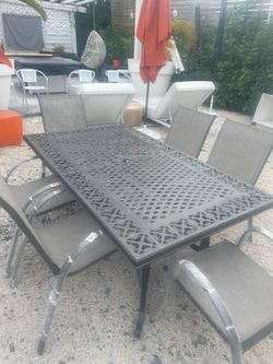 Outdoor Patio Aluminum Table with 6 Aluminum Stackable NEW Chairs