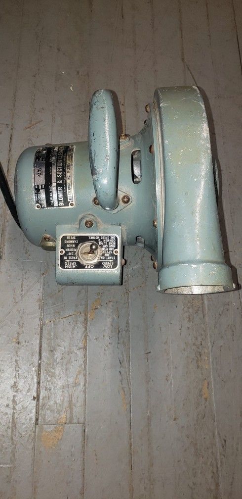 The device shown is a vintage Clements Cadillac Quik-Vac blower and suction cleaner, model F10, manufactured by Ace Sycamore, Inc. Key features includ