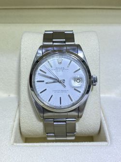 ROLEX DATE 1500 35MM $4000/OBO