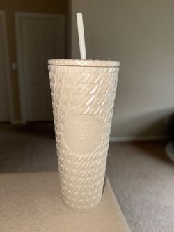 White chain Starbucks cup